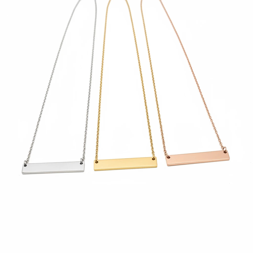 Roco Engraving custom bar necklaces in silver, gold, and rose gold stainless steel with mirror finish and thin chains