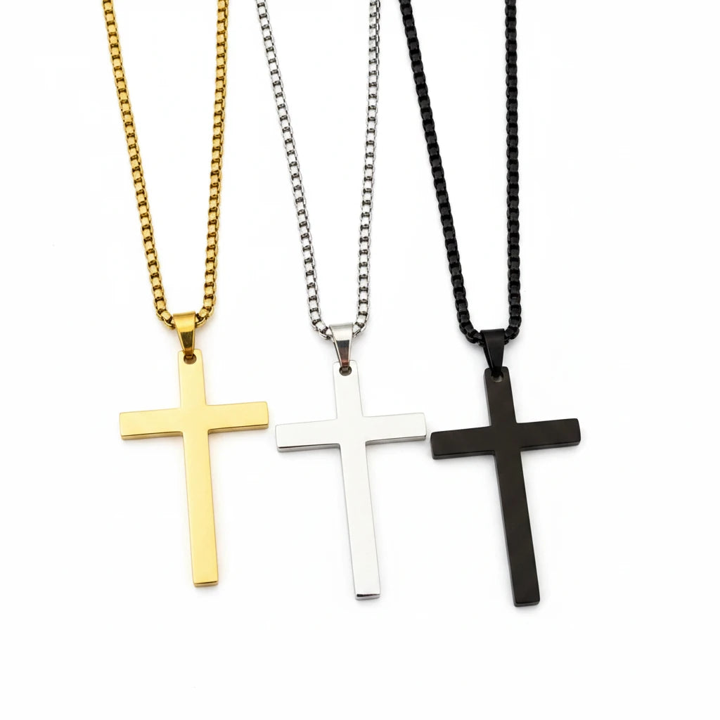 Roco Engraving custom cross necklaces in gold, silver, and black polished stainless steel with 18-inch chains.
