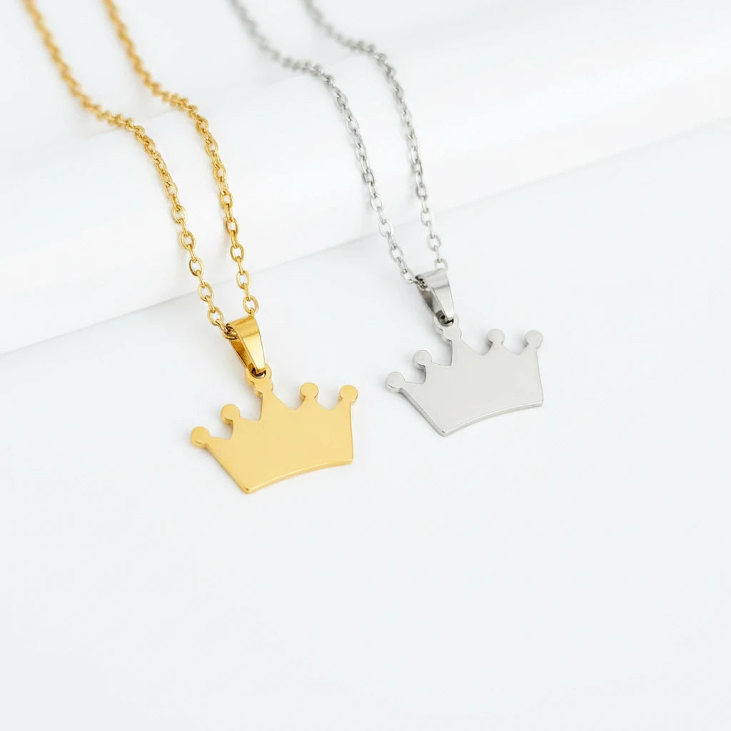 Roco Engraving gold and silver stainless steel crown pendant necklaces with mirror finish on delicate chains