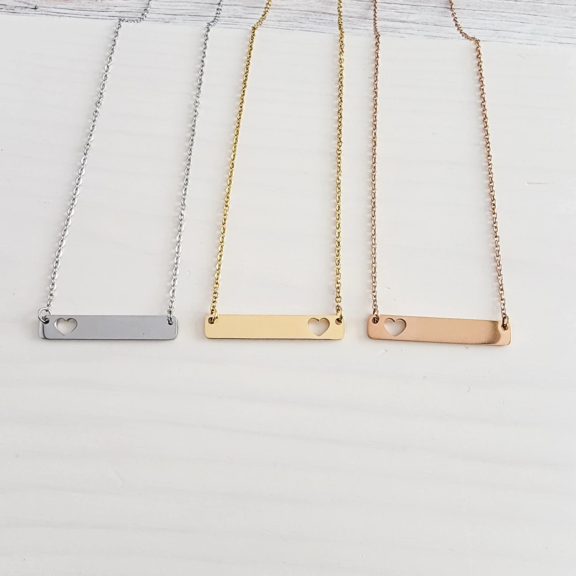 Roco Engraving custom heart bar necklaces in silver, gold, and rose gold stainless steel with mirror finish