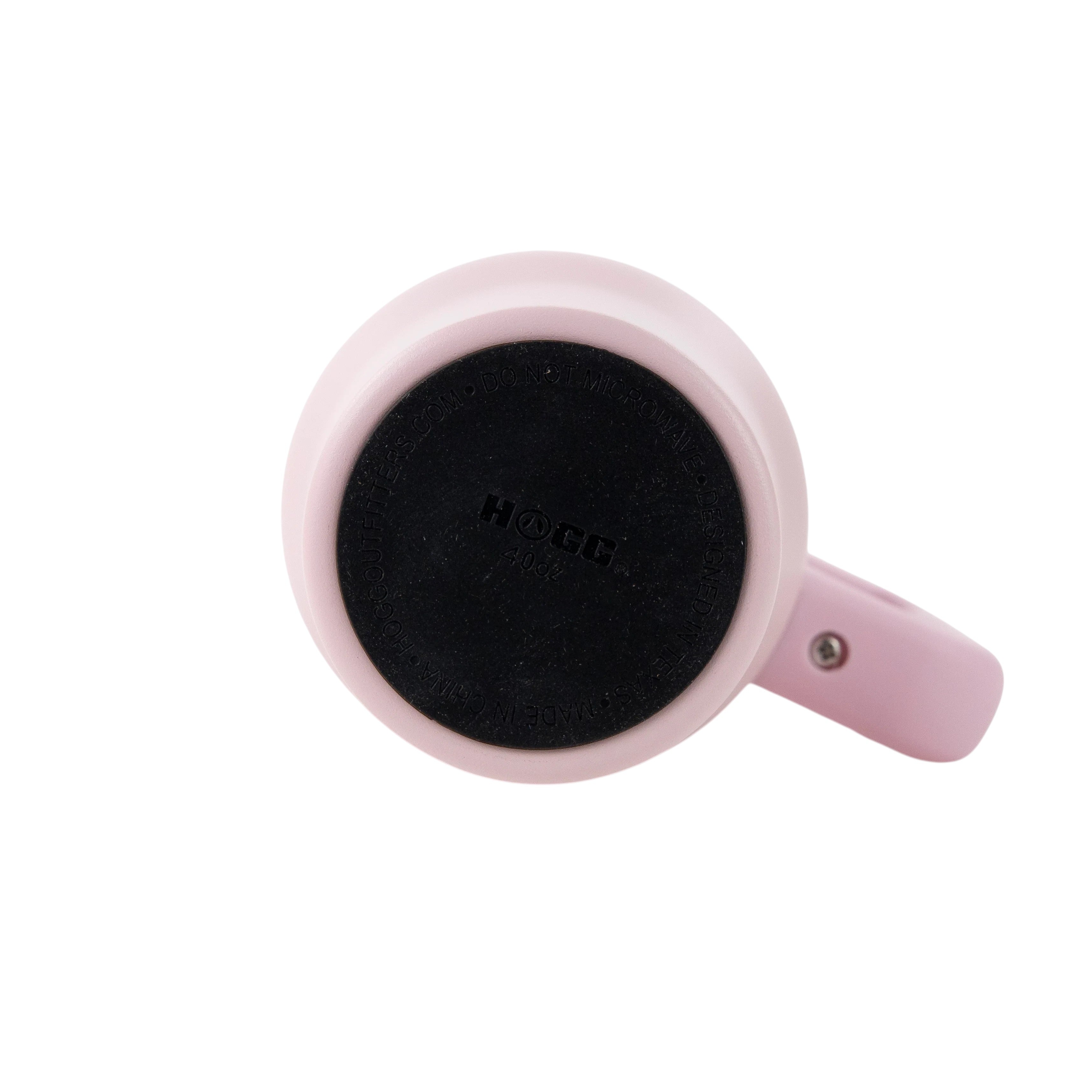 Bottom view of a light pink Roco Engraving 40oz Big Swig tumbler showing the black non-slip base