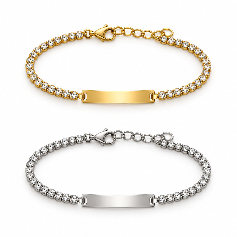 Clear-Stone ID Bracelet in gold, silver, each shown as a complete oval bracelet loop with visible clasp hardware on a white background. Each purchase includes one bracelet in the selected finish, not the full set.