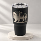 Black 30oz MakerFlo tumbler engraved with the Buffalo design, soft studio background