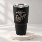 Black 30oz MakerFlo tumbler engraved with the Marines Emblem design, soft studio background