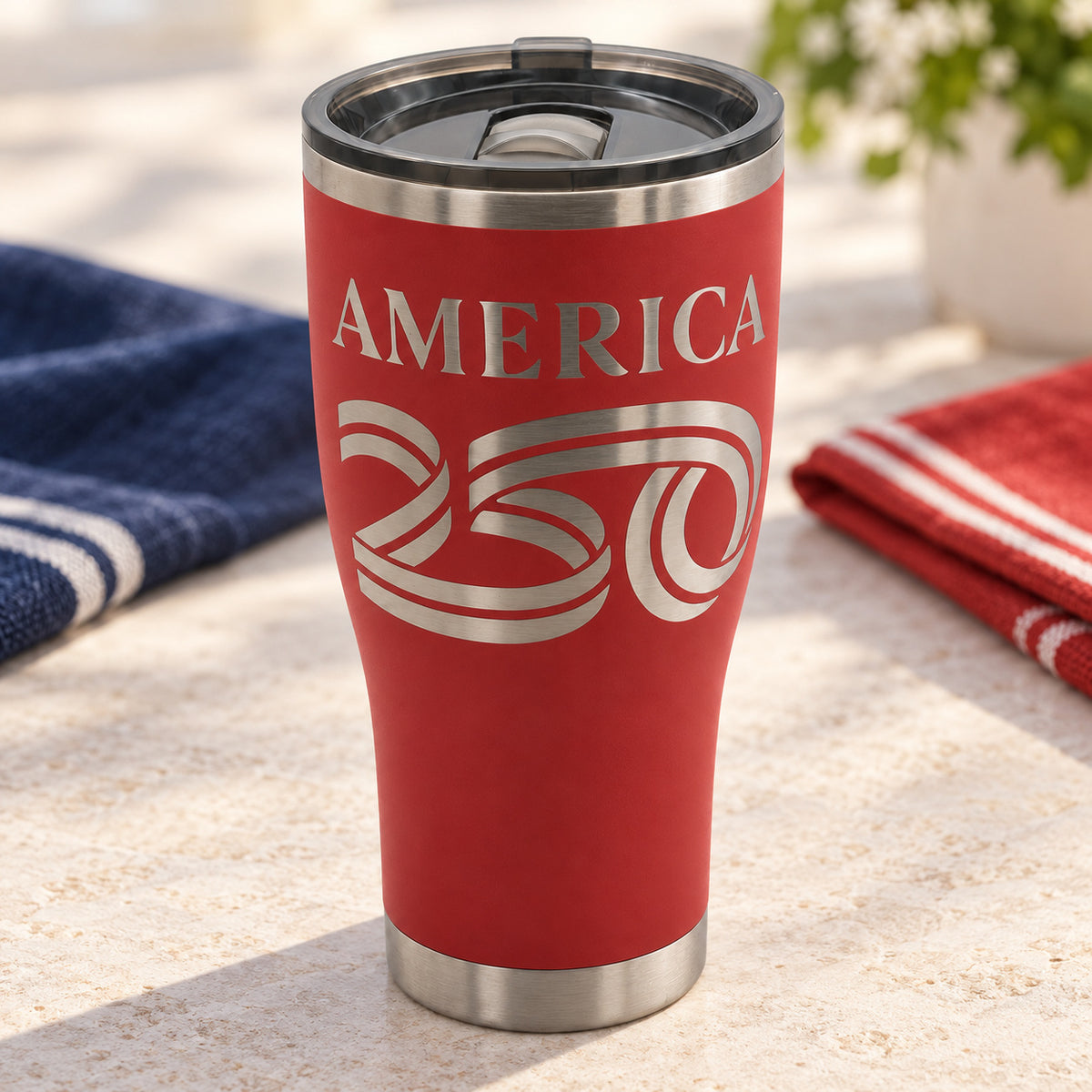 America250 HOGG 30oz Modern Curve engraved tumbler — america 250 red — 03 tabletop lifestyle