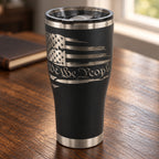 Black 30oz HOGG Modern Curve tumbler engraved with the We the People design, on a tabletop