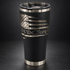 Black 30oz HOGG Modern Curve tumbler engraved with the We the People design, studio lighting