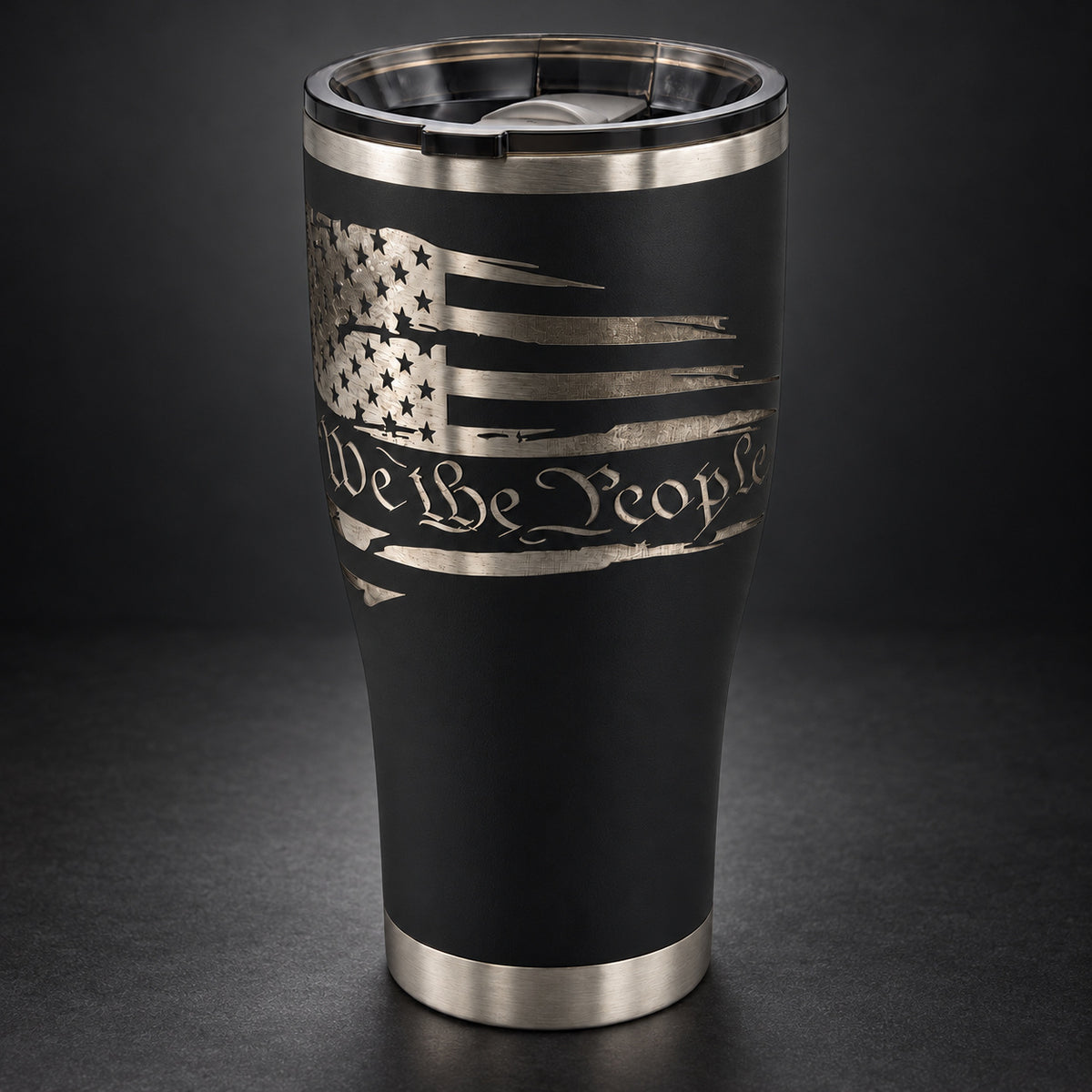 Black 30oz HOGG Modern Curve tumbler engraved with the We the People design, studio lighting