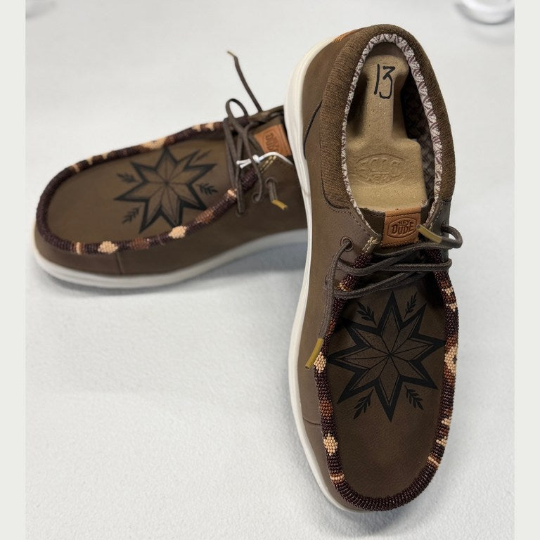 Two brown shoes personalized with geometric star designs